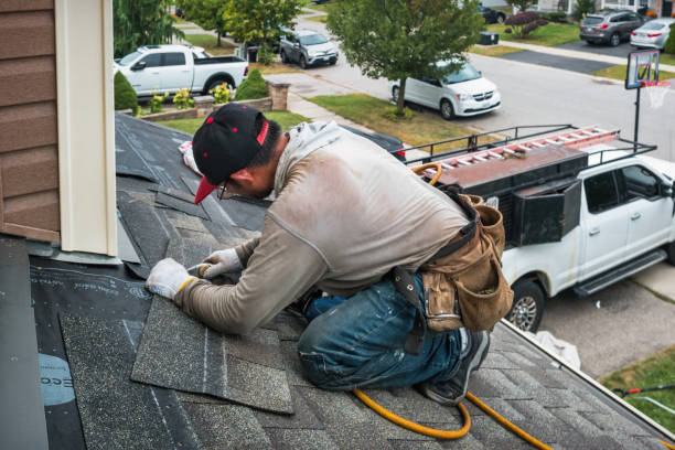 Professional Metal Roofing technician working in Montague, MA